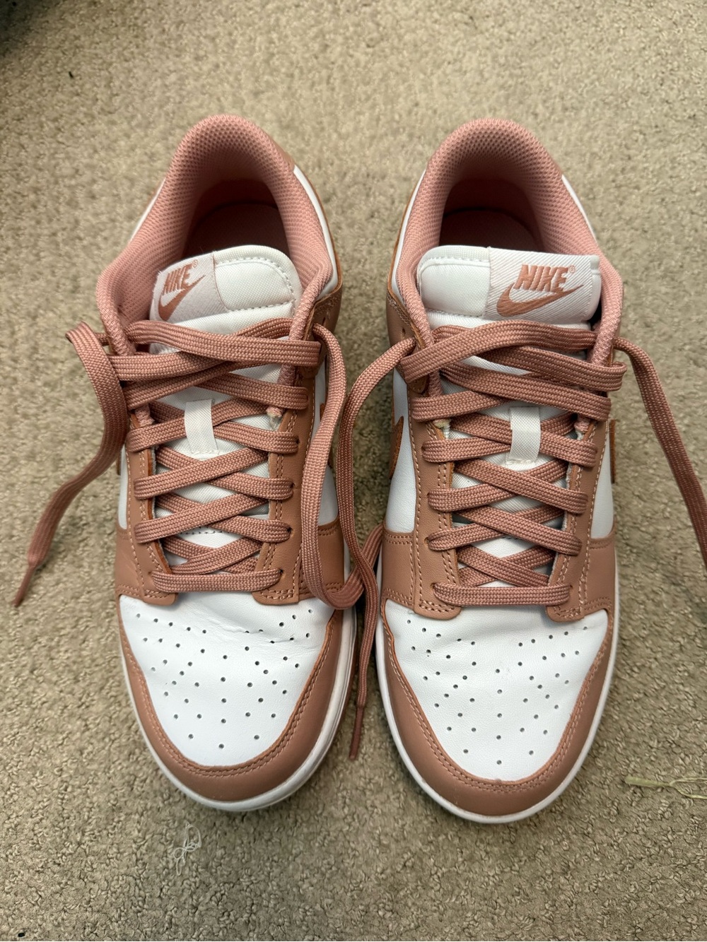 Nike Women's Dunks Low-Top Sneakers in Blush Pink and White